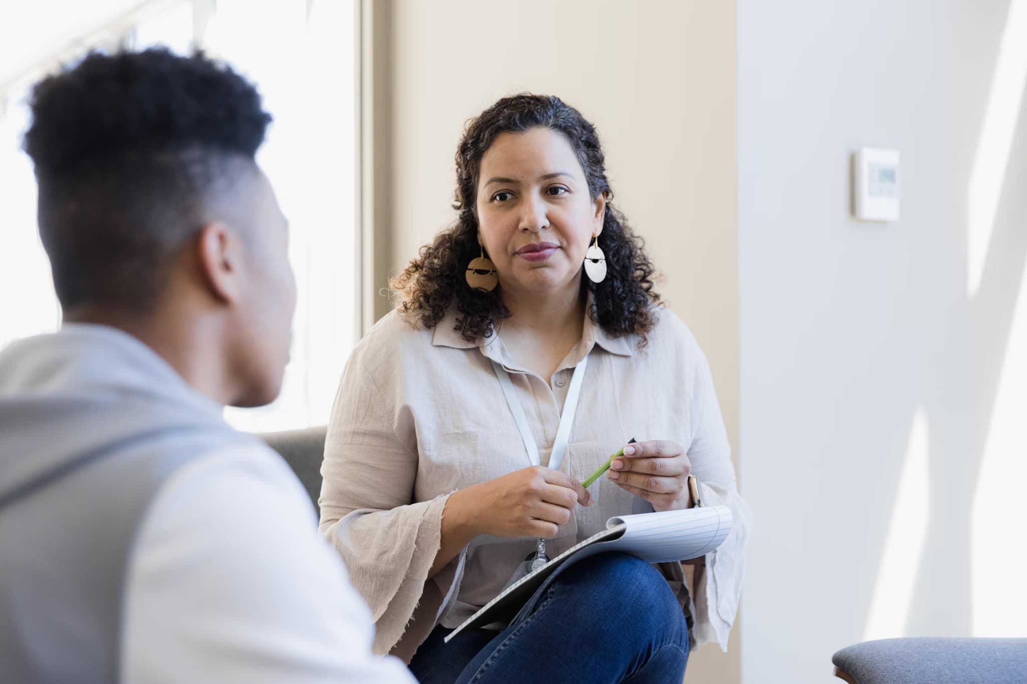 Woman talking to man