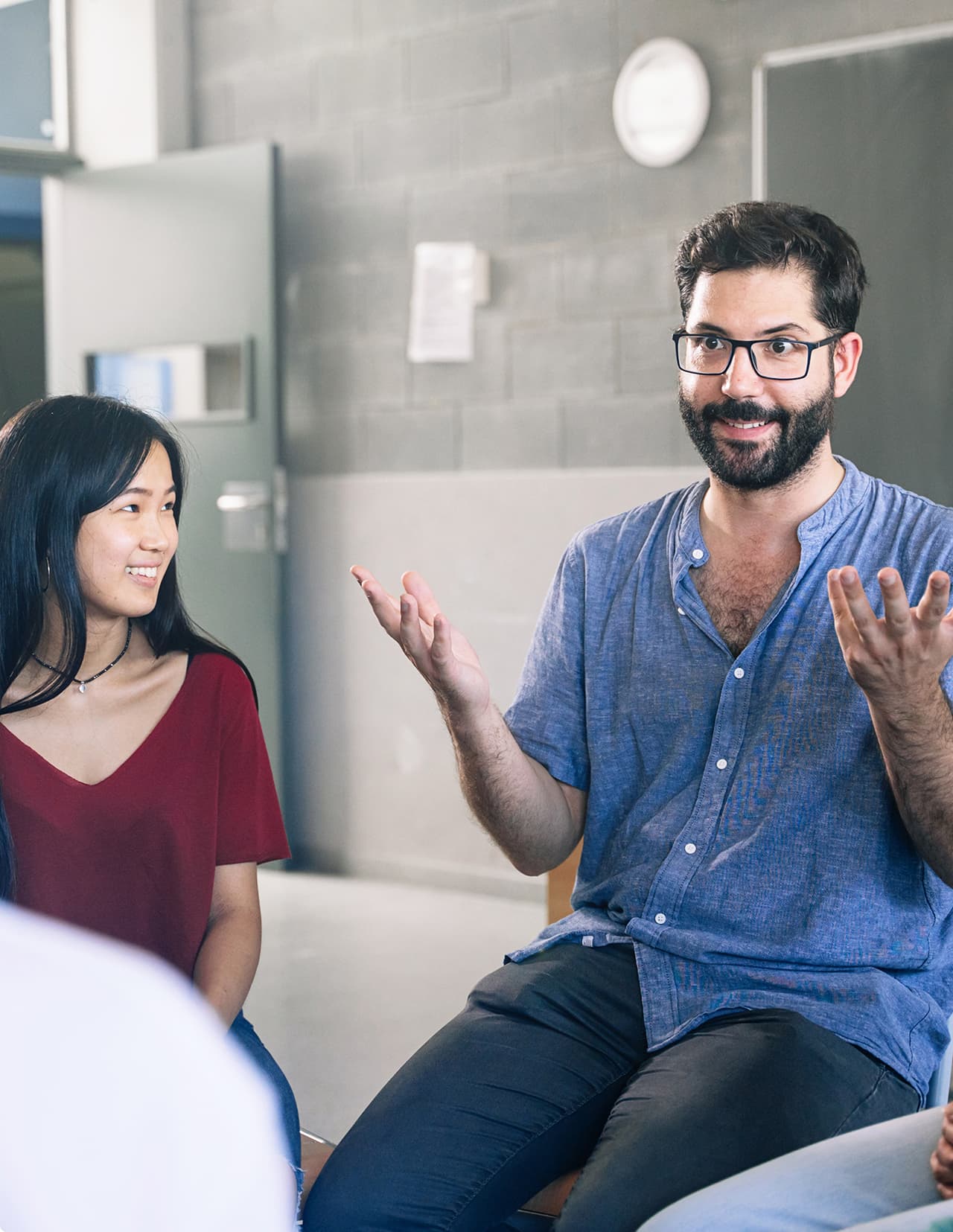 People connecting in a supportive group setting